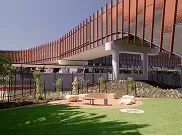 Modern campus building with landscaped courtyard