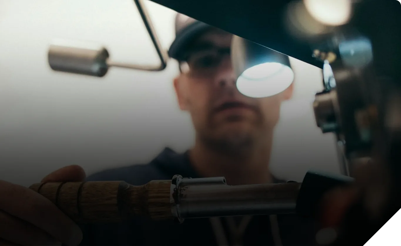Technician working on an MEP installation with a torch